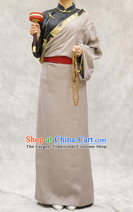 China Zang Nationality Clothing Ethnic Woman Stage Performance Costume Apricot Tibetan Robe